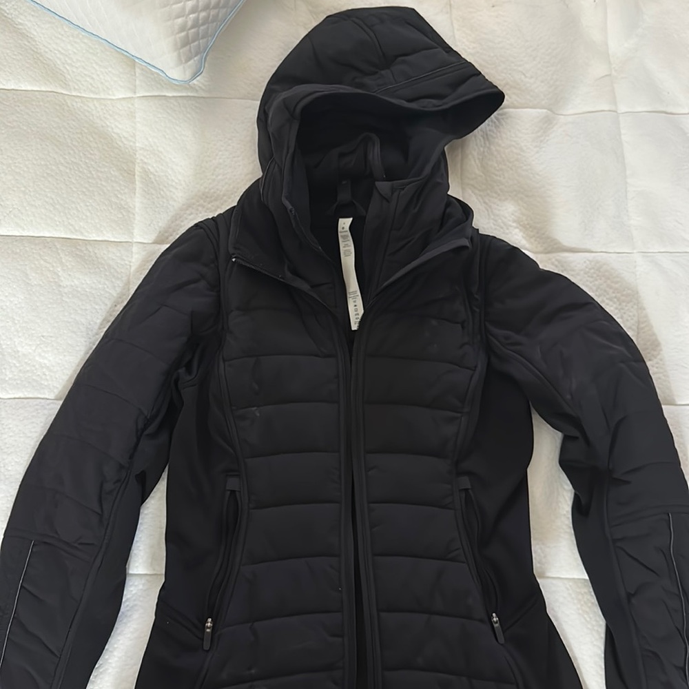 Black Lululemon jacket. Double zip, can remove inner “liner/hood”.